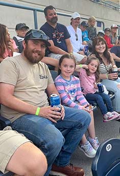 Monroe Environmental employees at a Mud Hens game