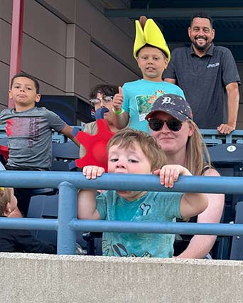 Monroe Environmental Employees and families at a Mud Hens game