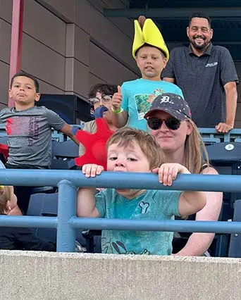 Monroe Environmental Employees and families at a Mud Hens game