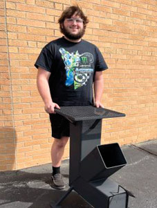 student in Ida HS welding program and his project