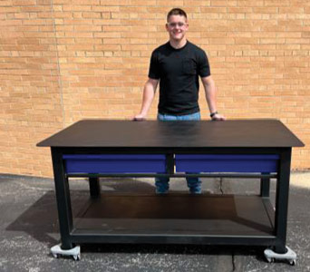student in Ida HS welding program and his project