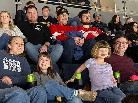 employees at hockey game 2026