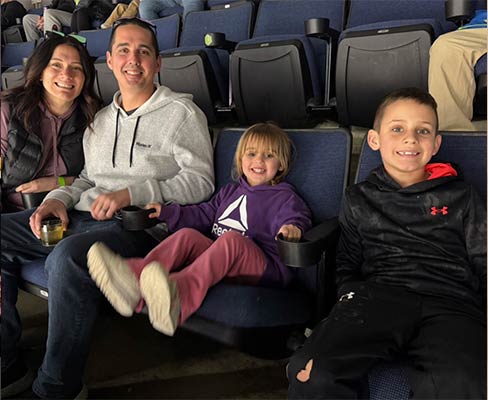 employees at hockey game 2026
