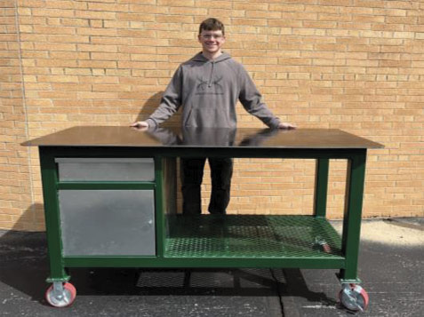 student in Ida HS welding program and his project