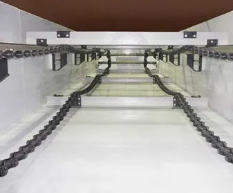 Chain and flight collector with non-metallic chain, flights, wear shoes, and flight supports. Chain and flight collector with non-metallic chain, flights, wear shoes, and flight supports.
