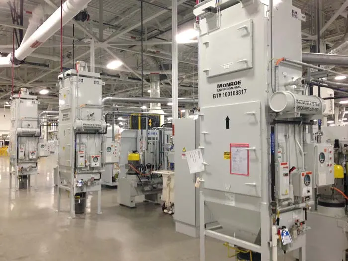 Cartridge Dust Collectors for dust filtration from grinding operation at an automotive manufacturing facility.