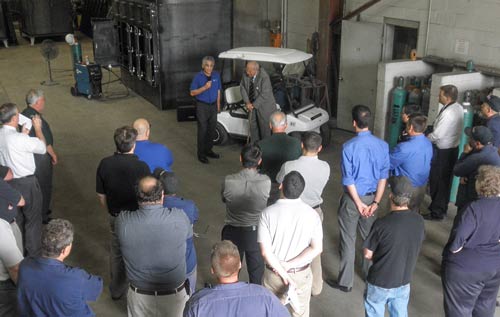 U.S. Congressman John Dingell speaking to Monroe Environmental employees U.S. Congressman John Dingell speaking to Monroe Environmental employees
