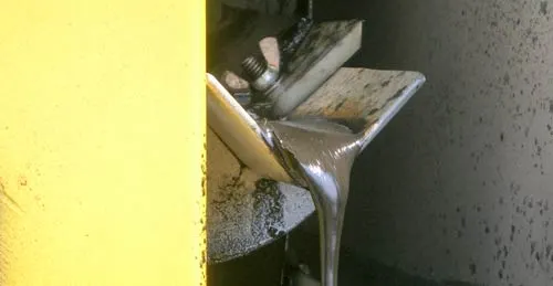 Monroe Oil Skimmer reclaiming condensed grease from venturi scrubber tank