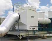 30,000 CFM Horizontal chemical fume scrubber with polypropylene construction to remove chemical fumes emitted from acid-dip tanks at a semiconductor manufacturing facility.