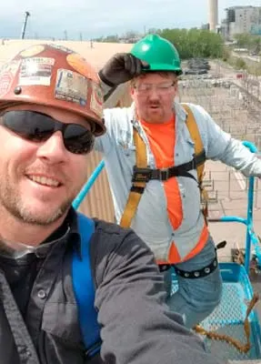 Monroe field techs at an installation