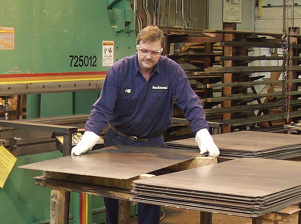 Worker in Monroe's fab shop