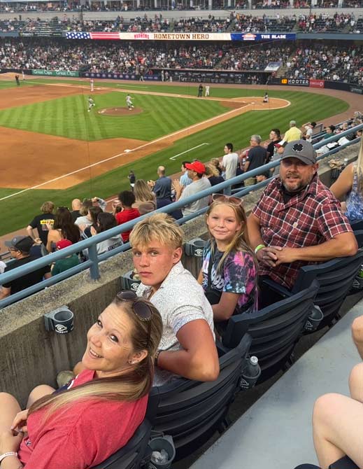 Monroe Environmental employees at a Mud Hens game