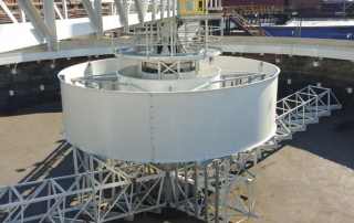 Primary scraper clarifier