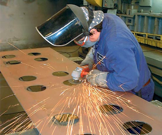 Worker in Monroe's Fab shop