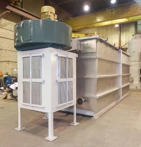 Waste steam evaporator with fan intake housing and insulated tankage Evaporator system
