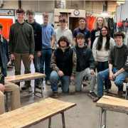 Ida students group shot with tables and benches