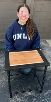 Ida student with table