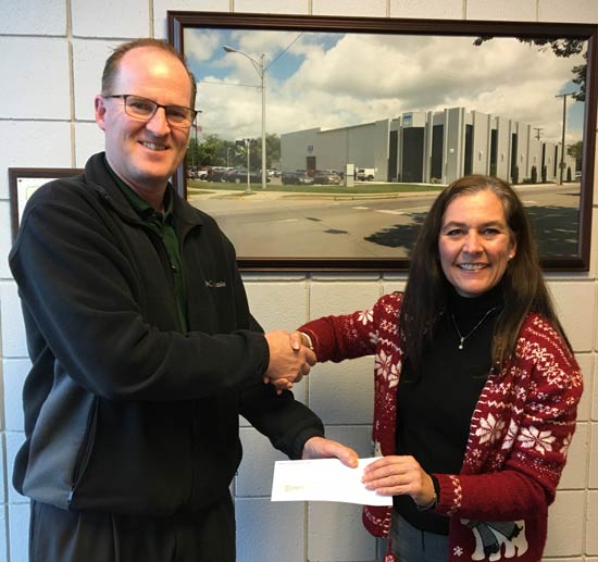 Monroe Environmental presents check to MCOP