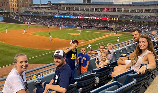Monroe at the Mud Hens game Monroe employees and their families watching the game