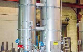 Sulfur dioxide scrubbing system with Quench Tower and Packed Tower Scrubber