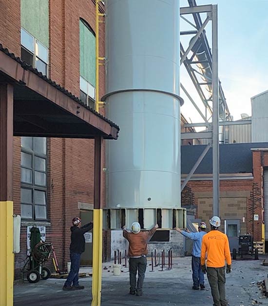 Guiding the discharge stack into final position