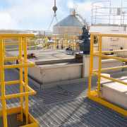 VC-2500 661 GPM Monroe Vertical Clarifier with thickener to separate the cobalt hydroxide formed in wastewater at a PTA plan. Shown here are the launder, mixer, and drive access.