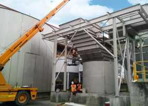 Plate clarifier water treatment: Lamella Plate Vertical Clarifiers with integral sludge thickeners for an automotive assembly plant’s wastewater treatment system