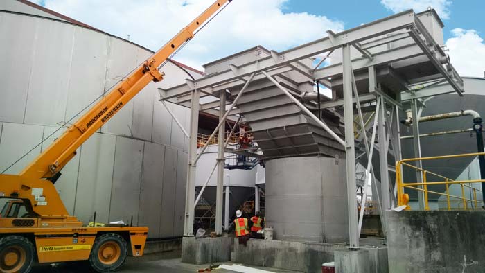Plate clarifier water treatment: Lamella Plate Vertical Clarifiers with integral sludge thickeners for an automotive assembly plant’s wastewater treatment system