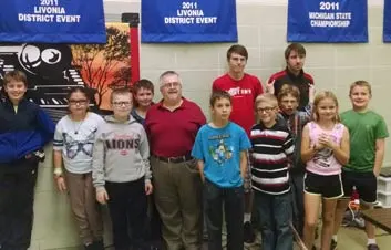 Monroe Environmental Engineer Dan Walch with group of students Monroe Environmental Engineer Dan Walch with group of students