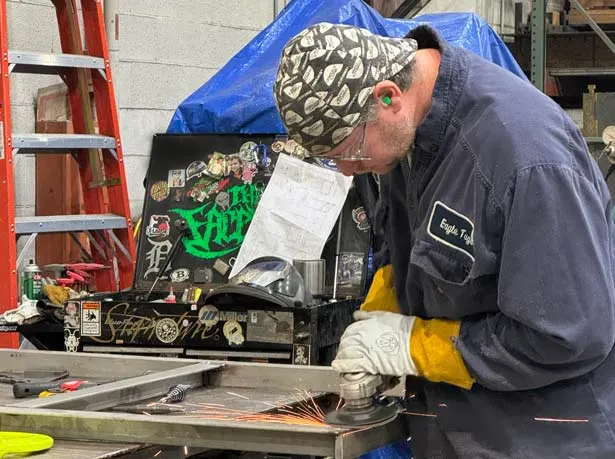 fabricator in Monroe's shop