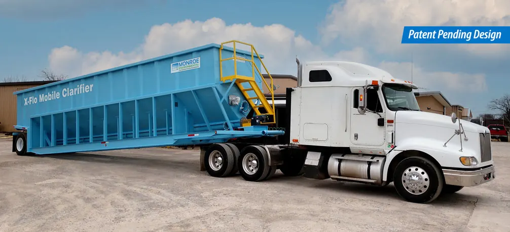 Monroe Environmental's mobile water treatment system, the X-Flo Mobile Clarifier transported by truck to jobsite